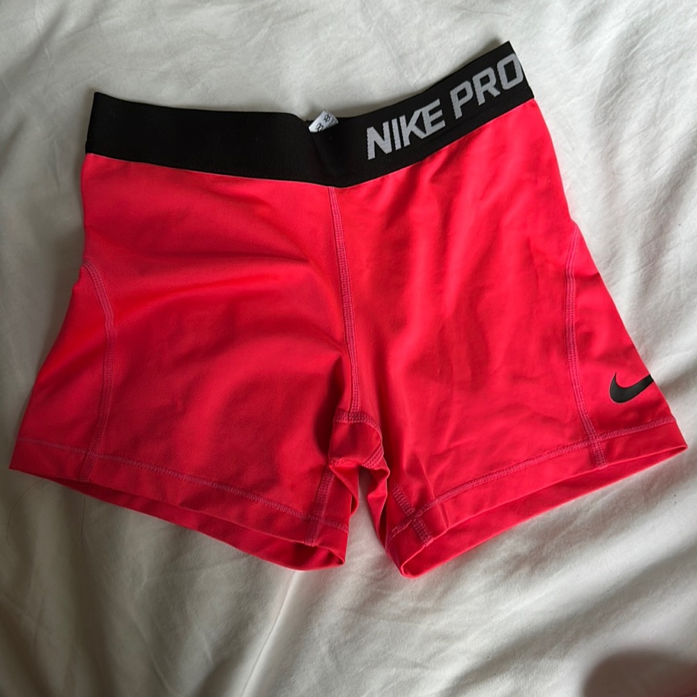 neon pink nike pros